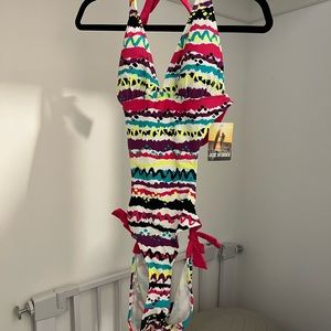 Joe boxer medium one piece swim suit. Never worn